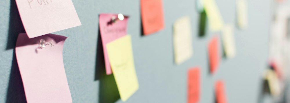 Colorful sticky notes arranged on a content planning board